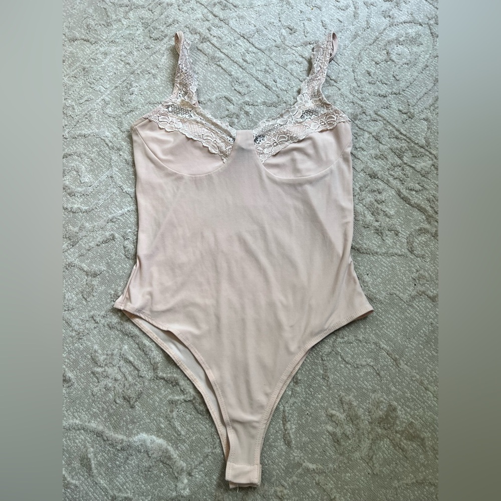 baby pink bodysuit